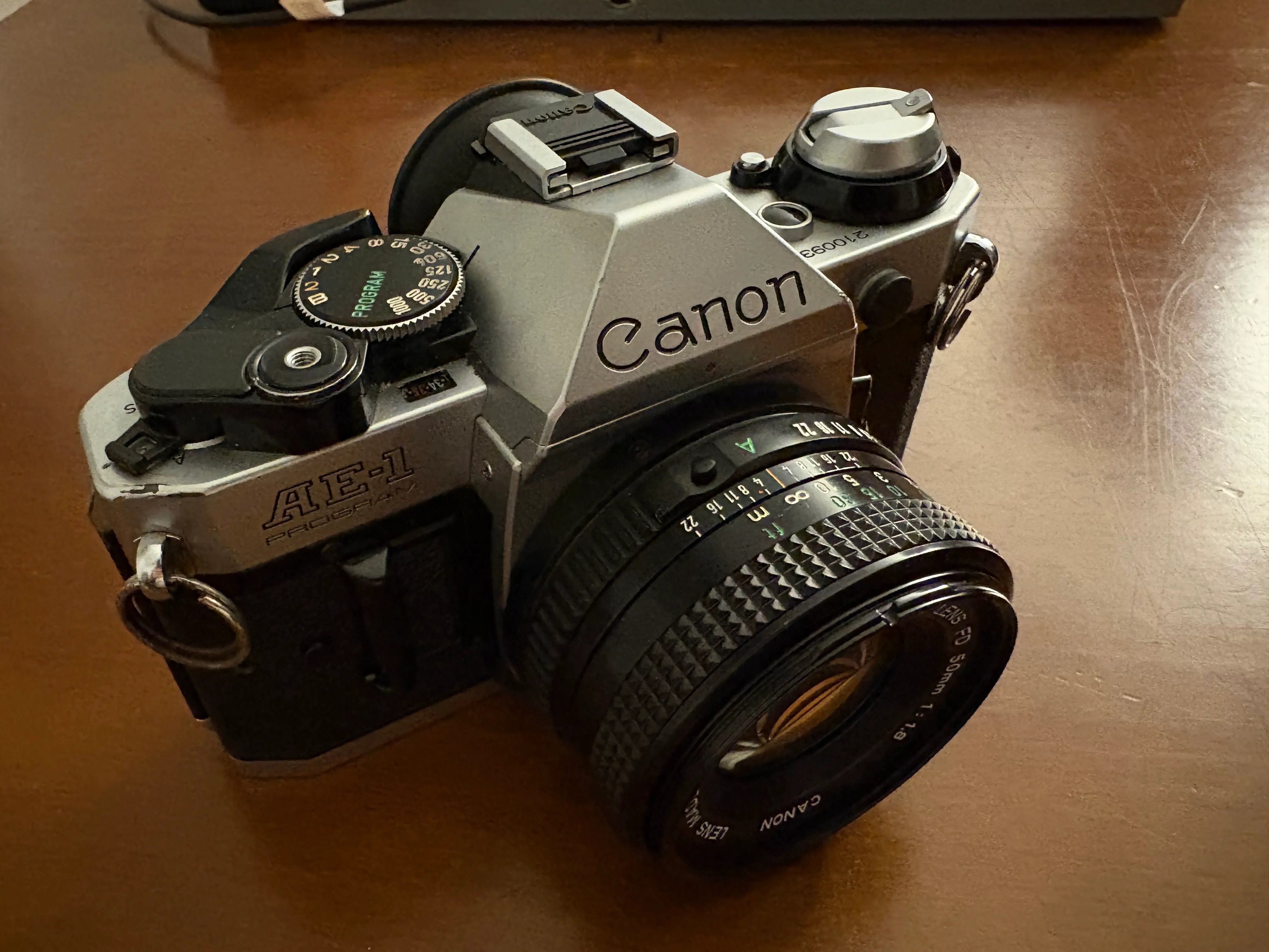A black and silver Canon AE-1 Program